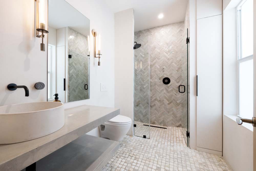 modern bathroom with reflecting mirror modern bathroom with reflecting mirror